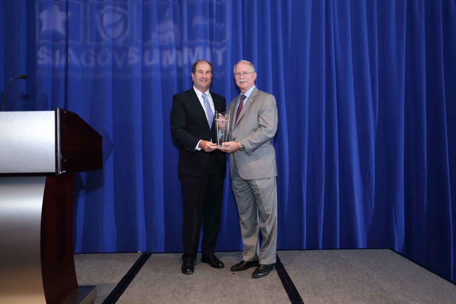 Congressman John Rutherford (right) receives the SIA Legislator of the Year Award for his work on the STOP School Violence Act following the Parkland shooting.